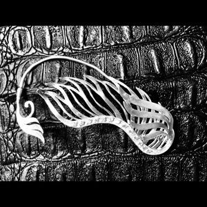 Sterling silver one earring wing shaped